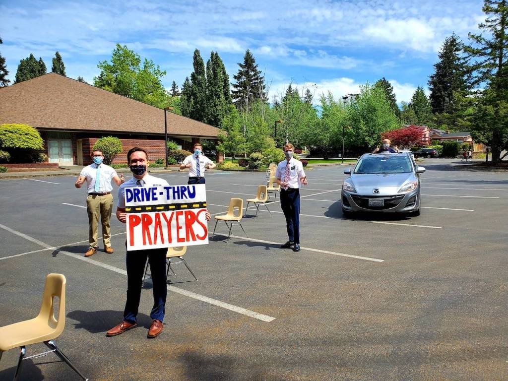 The Mercer Island Congregation of the Church of Latter-Day Saints has been hosting drive-thru prayers at the buildings parking lot. Photo courtesy Christoph Reiner