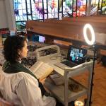Riley uses a savvy setup to replicate the feeling of being inside the building when hosting Zoom services. Photo courtesy Elizabeth Riley