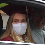 A Mercer Island High School senior at Junes drive-thru graduation ceremony. Photo by Joe Chen