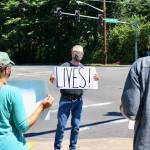 The brief strike was organized by community member Paul West (center). Blake Peterson/staff photo