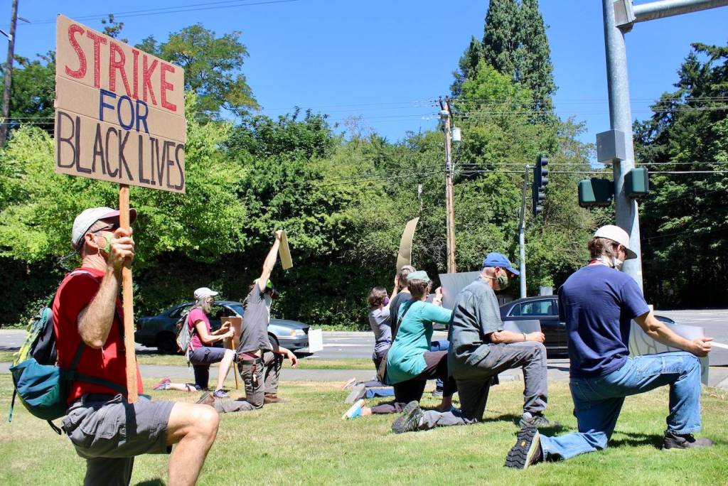 Starting at 12:05 p.m., protestors knelt for eight minutes and 46 seconds to honor George Floyd and other Black lives lost at the hands of police. Blake Peterson/staff photo