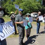 Protestors gathered for about a half-hour Monday. Blake Peterson/staff photo