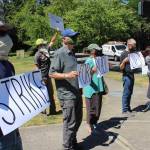 Protestors gathered for about a half-hour Monday. Blake Peterson/staff photo