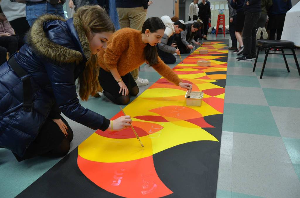 From left to right, students Emma Almo and Anna Jacoby get artistic at Northwest Yeshiva High School. Courtesy photo