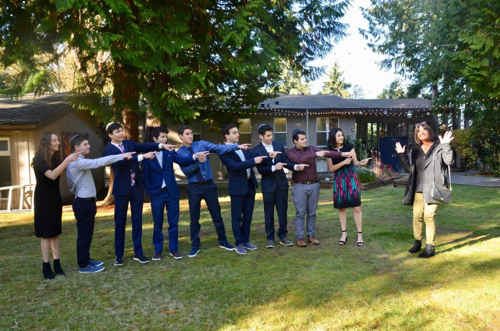 Northwest Yeshiva High School students have some fun with parent volunteer and board member Leah Gladstein. Courtesy photo