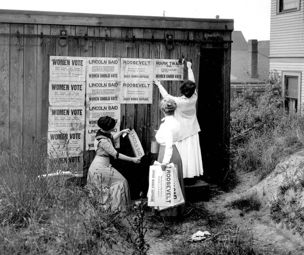 Washington State Archives                                The Washington Equal Suffrage Association places posters in Seattle in 1910 to promote womens suffrage.