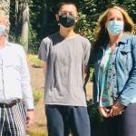 From left, Mercer Island High School principal Walter Kelly, National Merit semifinalist Kevin Wang and associate principal Lisa Deen. Photo courtesy of the Mercer Island School District