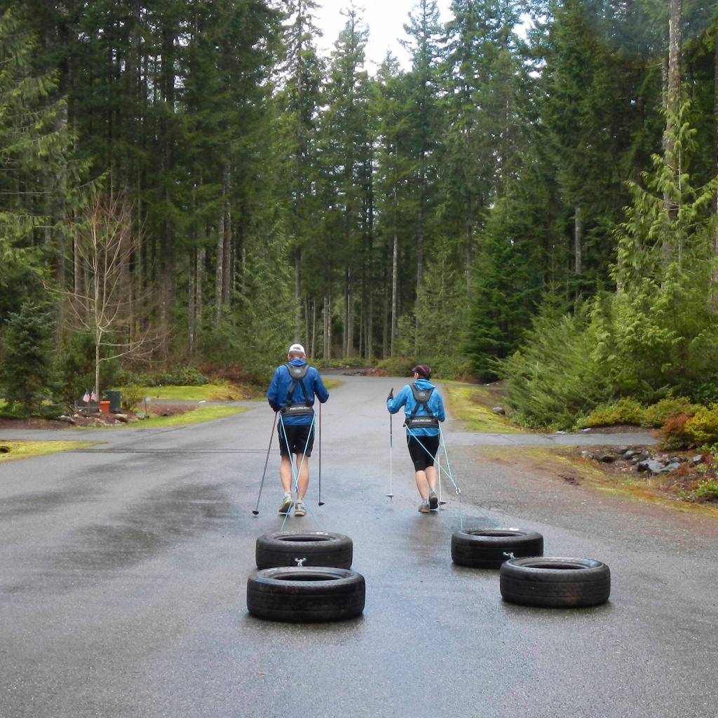 Marty and Chris Fagan training for their trek across Antarctica by pulling tires around North Bend. Contributed by Chris Fagan