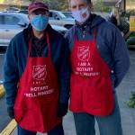 Mercer Island Mayor Benson Wong, left, and Police Chief Ed Holmes rang the bell for the Salvation Army donation drive Dec. 5 at the south end QFC. Courtesy photo