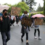 Rainy weather didnt deter protesters from marching on June 12 to protest the police killing of George Floyd, Breonna Taylor and other black Americans. Blake Peterson/staff photo
