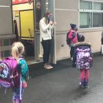 A kindergarten teacher greets students outside at Lakeridge Elementary School on Jan. 6. Photo courtesy of the Mercer Island School District