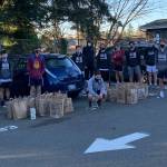 The Mercer Island High School boys soccer team scored big with a canned food drive, collecting more than 700 items during December, January and February. Courtesy photo