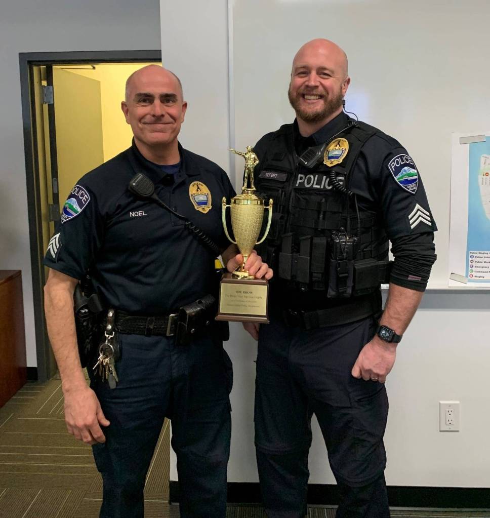 Sgt. Brian Noel (left) recently won another Mercer Island Police Department Top Gun Trophy. Noel is pictured with Sgt. Mike Seifert. Photo courtesy of the Mercer Island Police Department