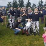 Nearly 100 people donned zebra masks and attire during a Rare Disease Day Show Our Stripes gathering on Feb. 28 on Mercer Islands Lid Park. Jill Hawkins welcomed the crowd along with Effie Parks, both moms of children with rare diseases. The city embraced the families and issued a proclamation for Rare Disease Day at the Feb. 16 city council meeting. On the business front, a host of local spots offered free zebra-striped masks. The zebra is the symbol for rare disease awareness. Photo courtesy of John Hamer