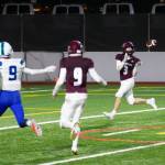 Mercer Islands Jack Durner snags a touchdown pass against Liberty on March 20. Liberty defeated Mercer Island, 21-20, in overtime at Mercer Island High School. Durner hauled in touchdown passes of 24 and 25 yards from quarterback Eli Fahey and Samuel Gilchrist snagged a 15-yard scoring pass from Fahey. Cole Drayton and Chase Shavey each had interceptions for the Islanders. Photo courtesy of David Wisenteiner