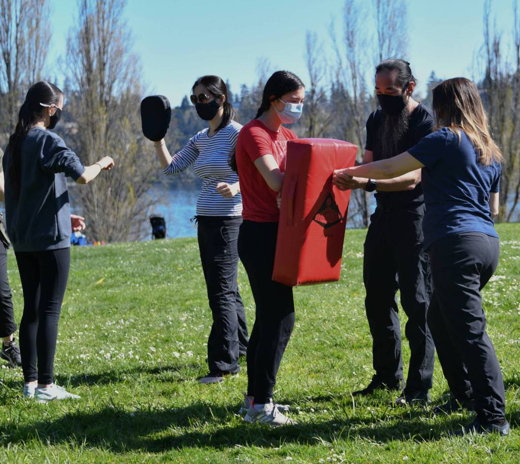 Brandon Uttech displays the proper punching and blocking techniques. Andy Nystrom/ staff photo
