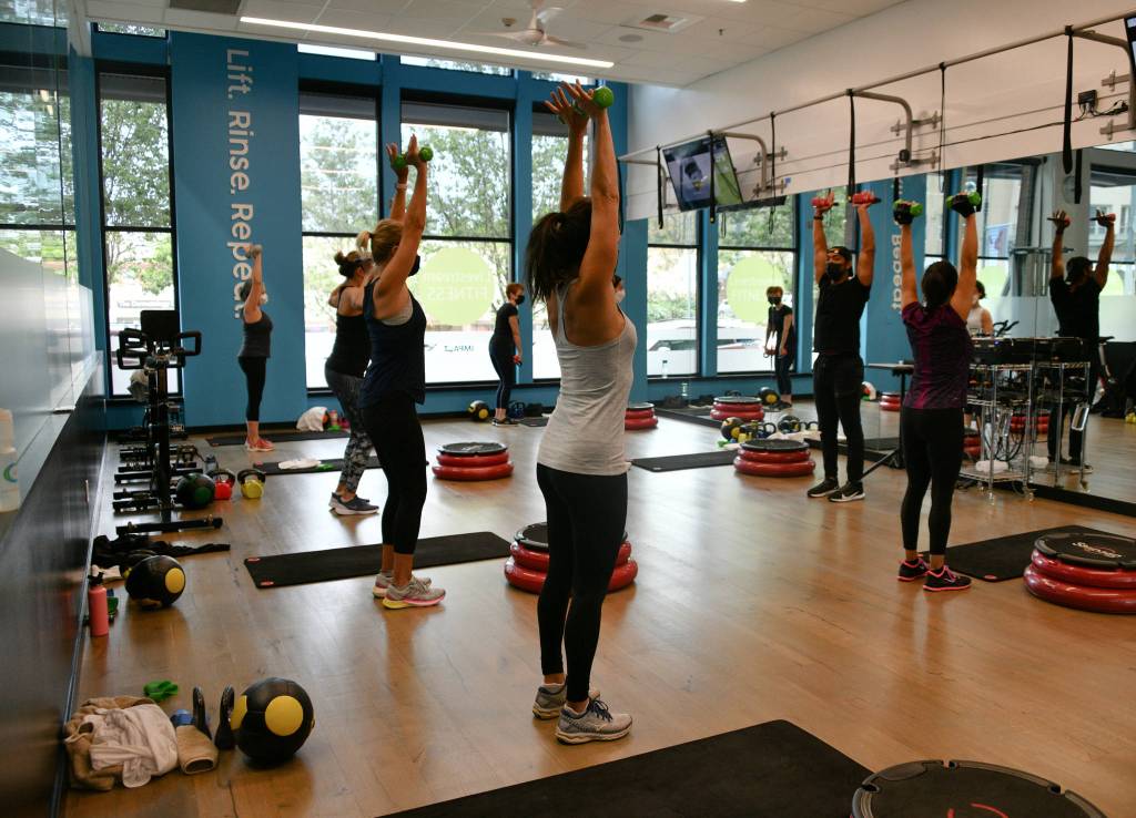 Class is in session at IMPACT Fitness + Training. Andy Nystrom/ staff photo