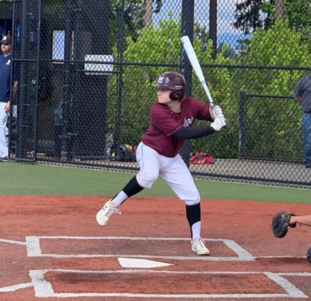 Mercer Island High Schools Nathan Buchan swings away in a game two seasons ago. Photo courtesy of Andre Marshall/ Boost Baseball