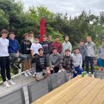 Harry McGovern sits second from left with members of the Mercer Island Young Mens Service Organization. Courtesy photo