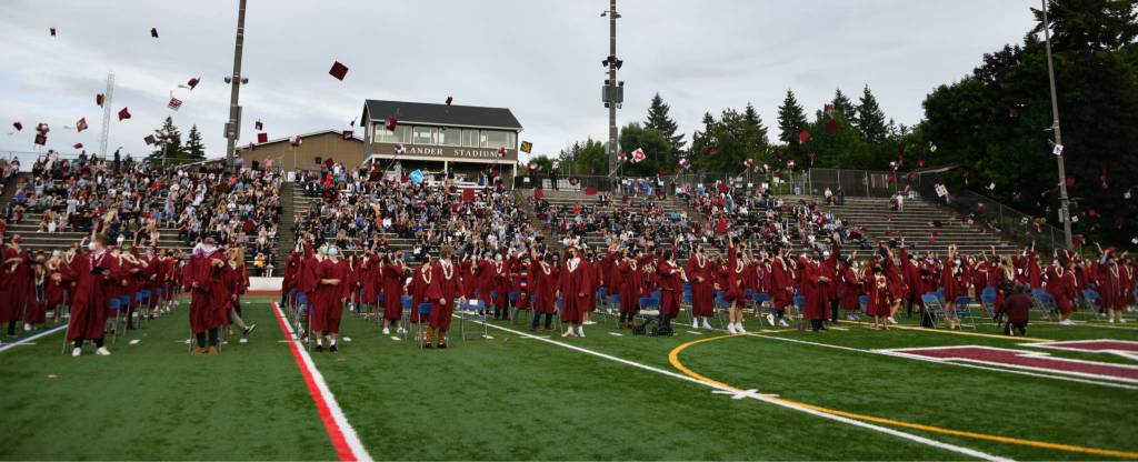 Crimson caps take flight. Andy Nystrom/ staff photo