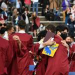 There were an abundance of hugs following the ceremony. Andy Nystrom/ staff photo