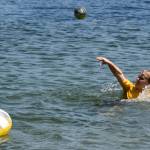 Rowan Ward tosses a football in Lake Washington off Luther Burbank Park on a sunny June 29. His sister Sienna watches. They were playing with their grandparents, Barb and Scott Middleton. Temperatures hit the mid- to upper-80s on this day, a far cry from the 100s on the previous days. Andy Nystrom/ staff photo