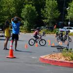 Pedalheads Bike Camp participants get their ride on in the Mercer Island Community and Event Center parking lot on June 29. Andy Nystrom/ staff photo