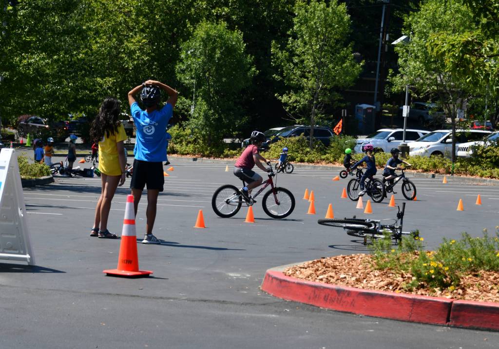 Pedalheads Bike Camp participants get their ride on in the Mercer Island Community and Event Center parking lot on June 29. Andy Nystrom/ staff photo