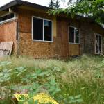 Mercer Island City Council has approved a resolution for the city to purchase the uninhabitable property at the busy intersection of Southeast 40th Street and Island Crest Way. Andy Nystrom/ staff photo