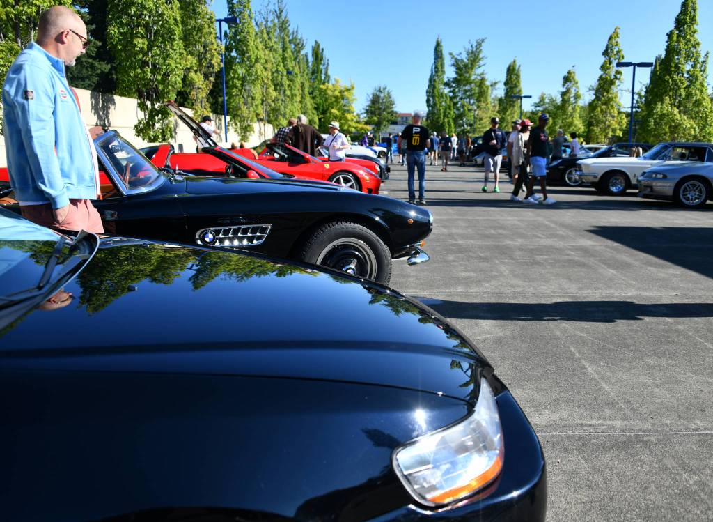 Attendees check out the rides at the Mercer Island Classic Car Show. Andy Nystrom/ staff photo