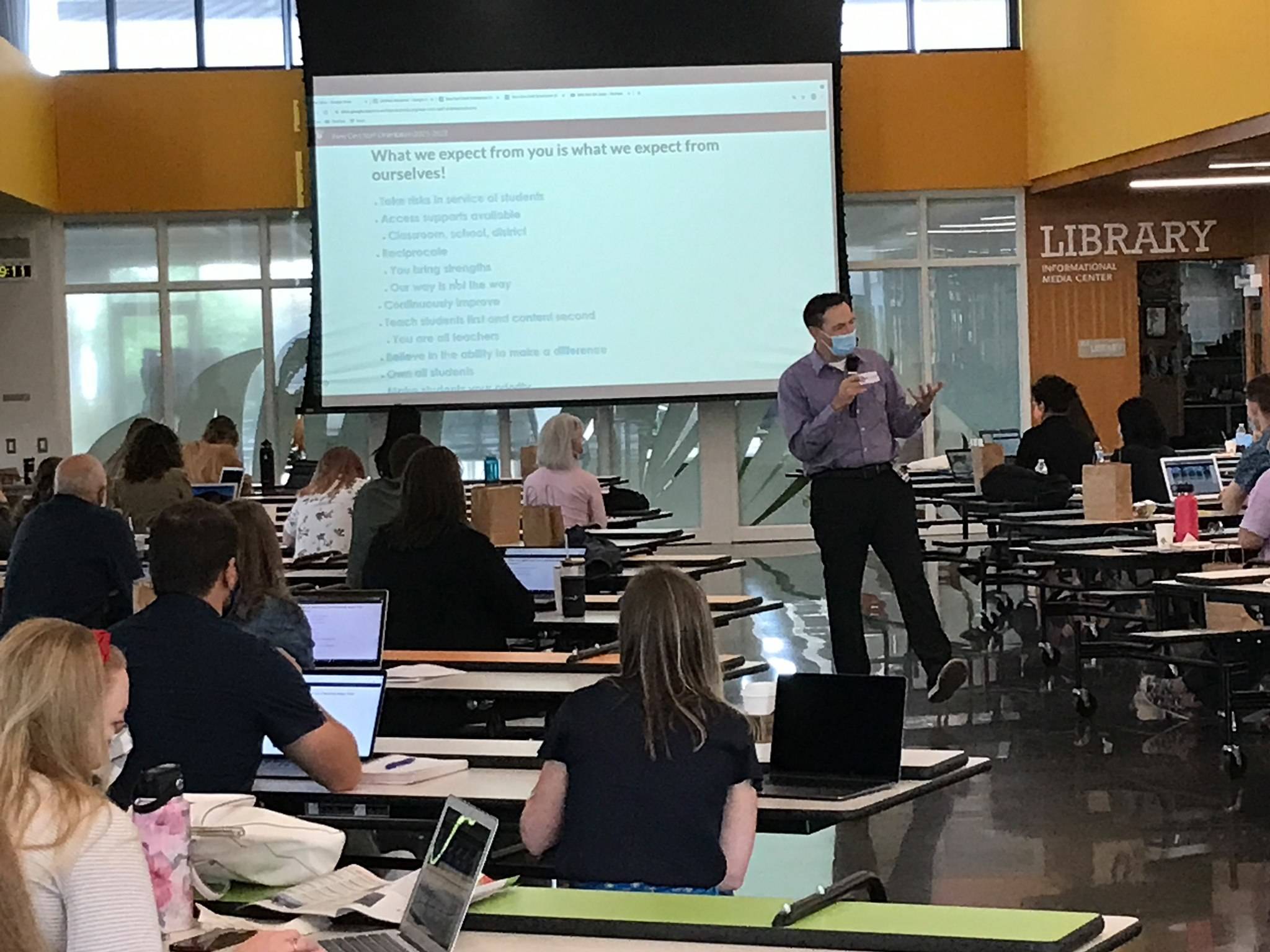 Deputy Superintendent Dr. Fred Rundle addressed the Mercer Island School Districts 38 new staff members on Aug. 23 as they began two days of orientation in the Northwood Elementary commons. Photo courtesy of the Mercer Island School District