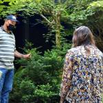 Matt Axe, the Wildfire and Forest Resiliency Coordinator with the King Conservation District, speaks to homeowner Anita Kissee-Wilder about fire reduction strategies at her home in North Bend on Aug. 24. Photo by Conor Wilson/Valley Record.