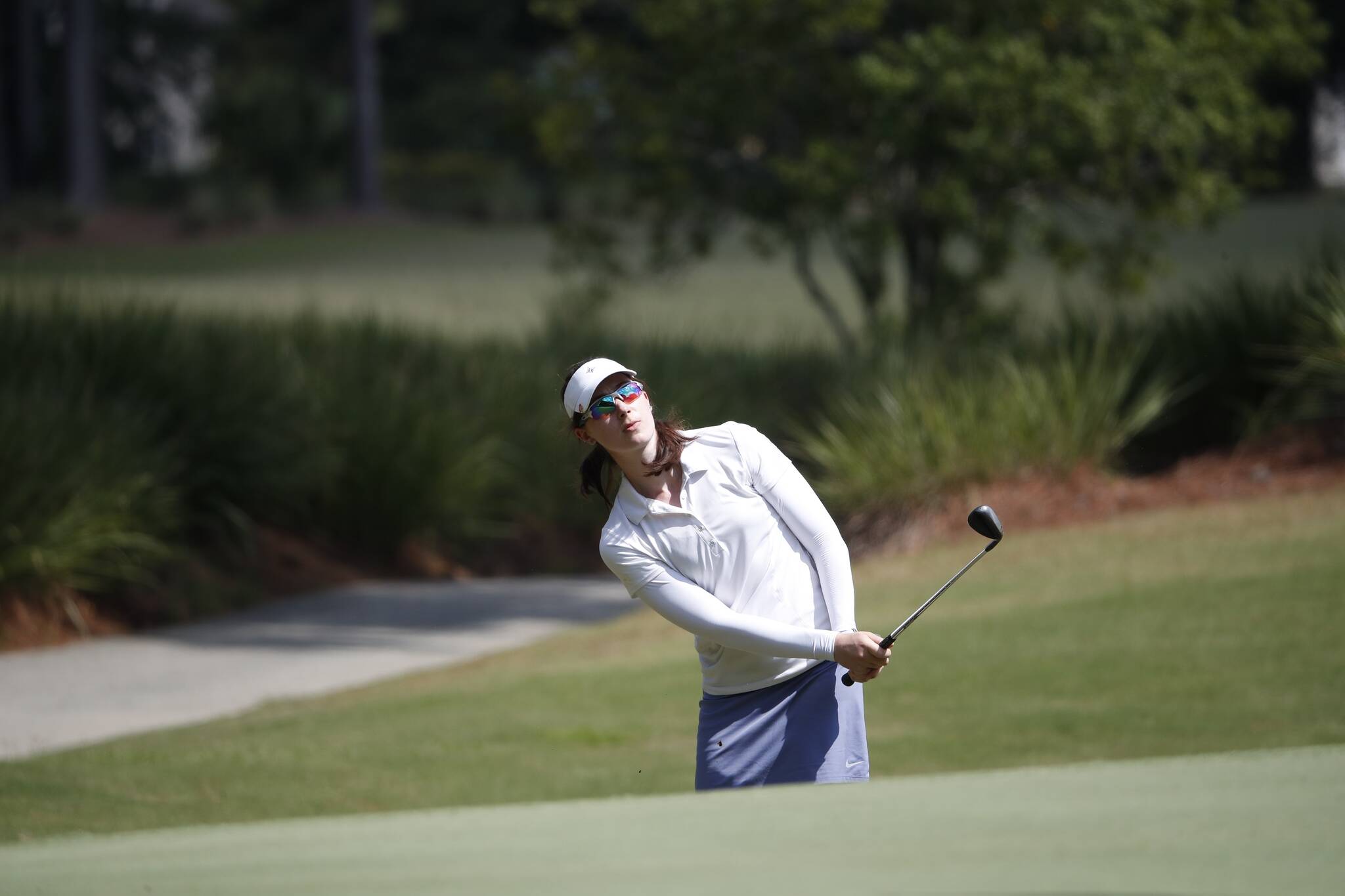 Mercer Islands Jacqueline Bendrick takes a shot during her 1 up victory over Stephanie Gelleni of Venezuela in a Round of 32 match on Sept. 28 in the 34th U.S. Womens Mid-Amateur Championship at Berkeley Hall Club in Bluffton, South Carolina. Later that day, 2015 champion Lauren Greenlief of the United States defeated Bendrick 2 up in a Round of 16 match. After qualifying for the Round of 64 in stroke play, Bendrick beat Julia Potter-Bobb of the United States, 5 and 3, to advance. A field of 132 golfers began the tournament on Sept. 25 in hopes of earning a United States Golf Association (USGA) title. Photo courtesy of Jeff Haynes/USGA