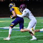 Mercer Islands Davis Johnson takes down Bellevues Caymus Rooney during 3A KingCo football action on Oct. 1. Bellevue won, 49-0. Photo courtesy of Stephanie Ault Justus