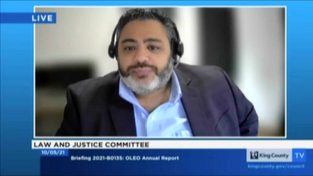 King County Office of Law Enforcement Oversight (OLEO) Director Tamer Abouzeid presents OLEOs annual report to the King County Council Law and Justice Committee on Tuesday, Oct. 5. (Screenshot)