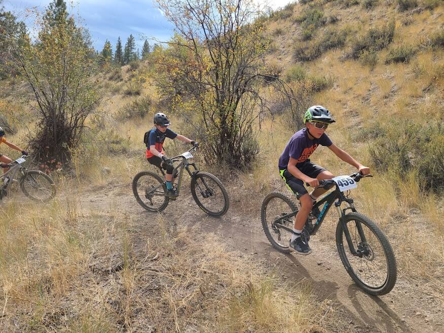Mercer Islands Zane Shiers (center) competes in the sixth-grade boys mountain biking race on Sept. 26 at Methow Valley. Shiers went on to take first over Ian Piacentino of Anacortes (right). Photo courtesy of Brian Shiers