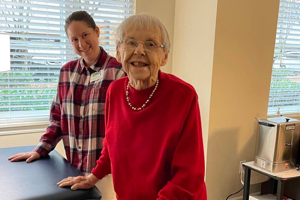 Island House resident Adah Edwards works on balance and strength exercises with Physical Therapist Chrissy Phillips. There are many advantages to having health professionals just down the hall!