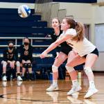 Mercer Islands Spenser Elwell, right, keeps the ball alive during an early season match. Photo courtesy of Stephanie Ault Justus