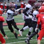 Chase Kelly runs up field for the Mercer Island Boys and Girls Clubs sophomore tackle football squad. Photo courtesy of Jay Azose