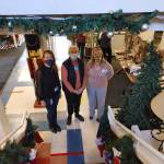 From left to right, Megan Schoephoerster, Lola Deane and Jennifer Glick at the Mercer Island Thrift Shop. Andy Nystrom/ staff photo
