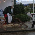 Don Kovarik trims a tree at the Mercer Island Youth and Family Services (YFS) Foundation tree lot on Dec. 2. The lot  located at the old Tullys parking lot at 7810 SE 27th St. - will be open through Dec. 12 on Thursdays (3-7 p.m.), Fridays (3-7 p.m.), Saturdays (10 a.m. to 5 p.m.) and Sundays (10 a.m. to 5 p.m.). All the proceeds from sales support YFS programs. Andy Nystrom/ staff photo