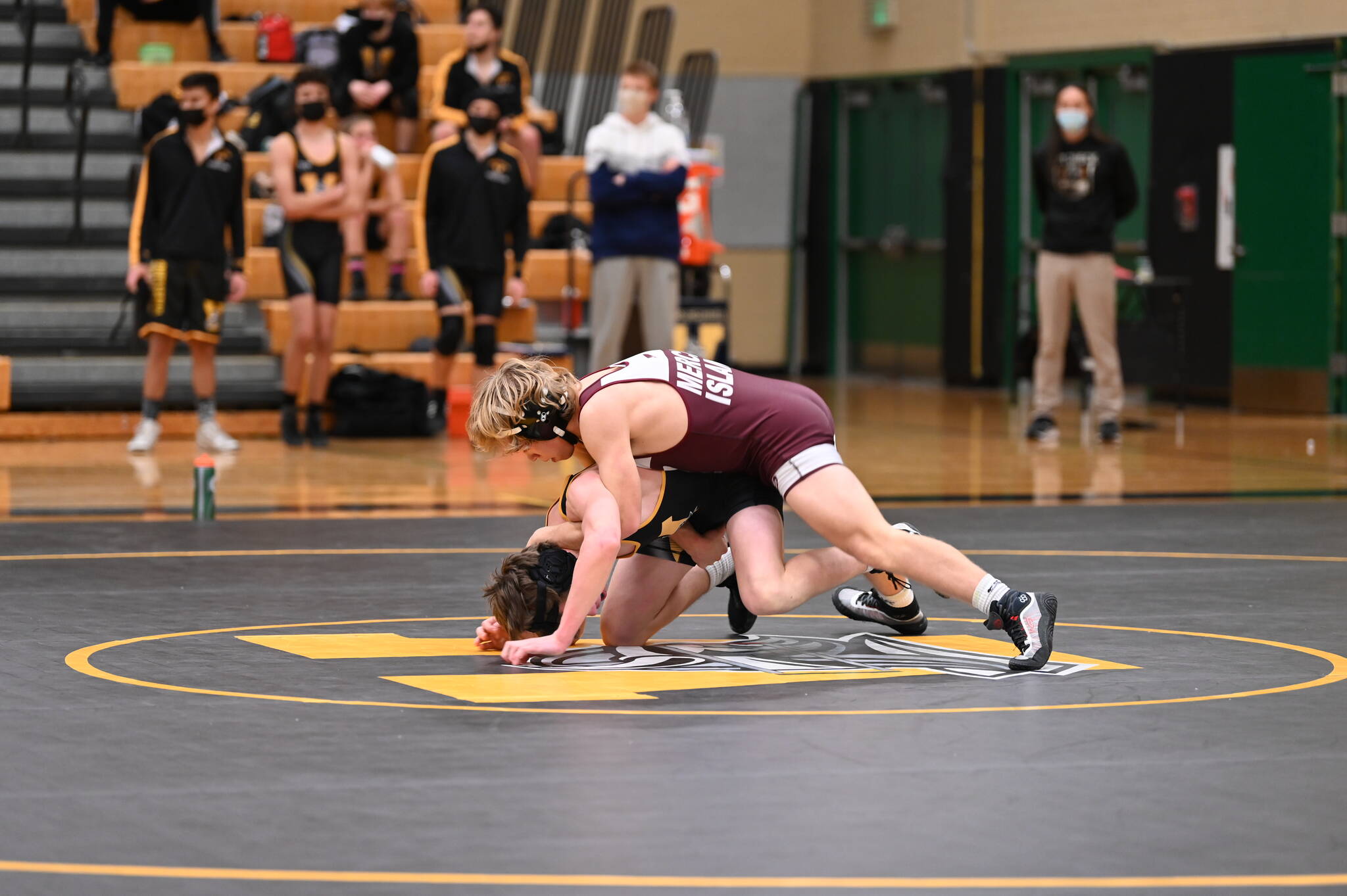 Mercer Island High Schools Lincoln Woods wrestles an Inglemoor High School opponent on Dec. 2. Woods won by a fall at 2:30. Courtesy photo