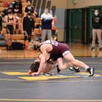Mercer Island High Schools Lincoln Woods wrestles an Inglemoor High School opponent on Dec. 2. Woods won by a fall at 2:30. Courtesy photo