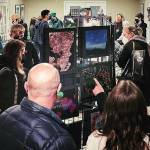 Attendees check out the Mercer Island High School students art on Dec. 9. Courtesy photo