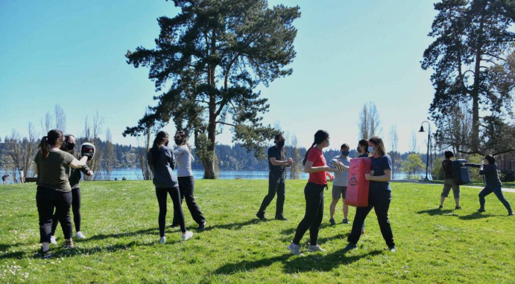 Mercer Islanders participate in an introduction to self-defense course on April 17 at Luther Burbank Park. Sophy Yang participated in the introductory course with her daughter Chloe, who helped organize the course in the wake of anti-Asian hate crimes in the United States. Andy Nystrom/ staff photo