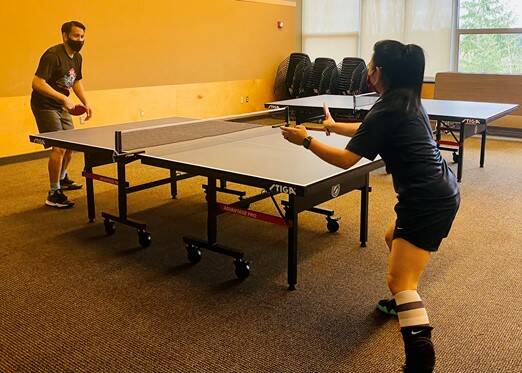 Ping-pong players concentrate on their shots. Photo courtesy of city of Mercer Island