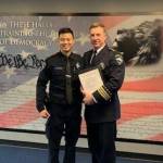 The Mercer Island Police Department recently welcomed its newest officer, Huy Nguyen, left. Last month, he graduated from the police academy, where he was greeted by Mercer Island Police Chief Ed Holmes, right. Nguyen was born and raised in Vietnam and completed school and worked in Ho Chi Minh City. Nguyen, his parents and his younger sister immigrated to the United States in 2018, and he served as an airman for the United States Air Force and now continues his military service as a reservist. Courtesy photo