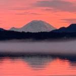 Photo courtesy of Abbie Crane, who writes that on Jan. 12, 2022, I walked on the East Lake Sammamish Trail at about 4:30 p.m. The combination of a colorful, beautiful sunset and a bank of fog on the lake made these pictures very special. Mt. Rainier made an appearance.