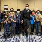 Mercer Island Police Department corporal Bobby Jira and officer Nick Palandri recently welcomed members of Cub Scout Pack 624 for Sticker Day. Each troop member received a police department sticker and talked with officers about what their jobs are like in the community. Photo courtesy of the Mercer Island Police Department
