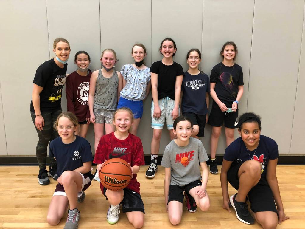 Fifth-graders: Front row, from left to right: Kiki Punke, Carolyn Miller, Elsa Lee and Mattie Onyango. Back row, from left to right: Coach Erin McCaslin, Nikki Nguyen, Quinn OMalley, Sarah Hoole, Stella Lanz, Madison Conca and Nova Hagen. Not pictured: Macy Feimster and Blair Evans. Courtesy photo